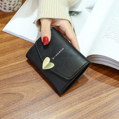 Γυναικείο έκο δερμάτινο πορτοφόλι με μεταλλικό κούμπωμα και φερμουάρ