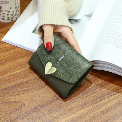 Γυναικείο έκο δερμάτινο πορτοφόλι με μεταλλικό κούμπωμα και φερμουάρ