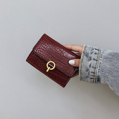 Γυναικείο έκο δερμάτινο πορτοφόλι με μεταλλικό κούμπωμα τέσσερα χρώματα