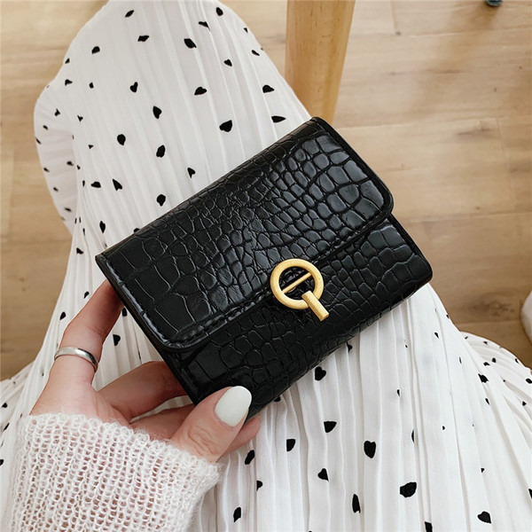 Γυναικείο έκο δερμάτινο πορτοφόλι με μεταλλικό κούμπωμα τέσσερα χρώματα