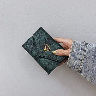 Γυναικείο πορτοφόλι με μεταλλική διακόσμηση