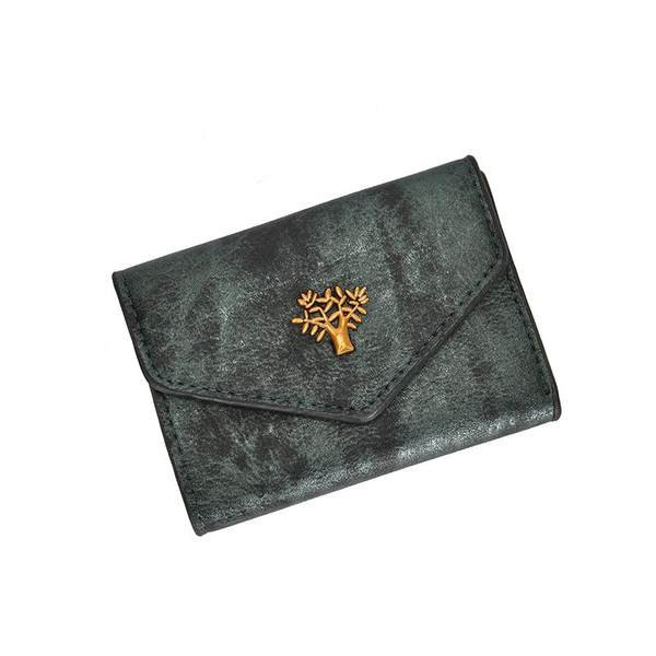 Γυναικείο πορτοφόλι με μεταλλική διακόσμηση 