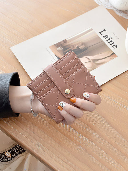 Έκο δερμάτινο γυναικείο πορτοφόλι νέο μοντέλο με μεταλλική στερέωση και τσέπη για χρεωστικές κάρτες