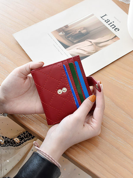 Έκο δερμάτινο γυναικείο πορτοφόλι νέο μοντέλο με μεταλλική στερέωση και τσέπη για χρεωστικές κάρτες