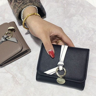 Mūsdienīgs ādas maks ar kulonu