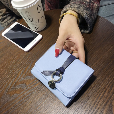 Mūsdienīgs ādas maks ar kulonu