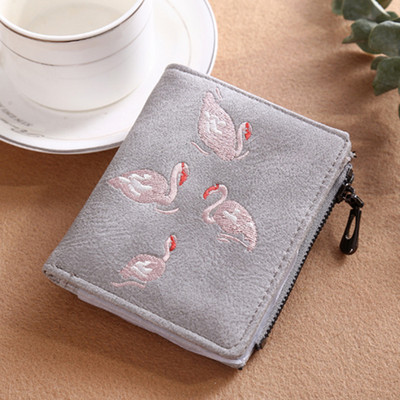 Μοντέρνο γυναικείο πορτοφόλι με κέντημα και φερμουάρ