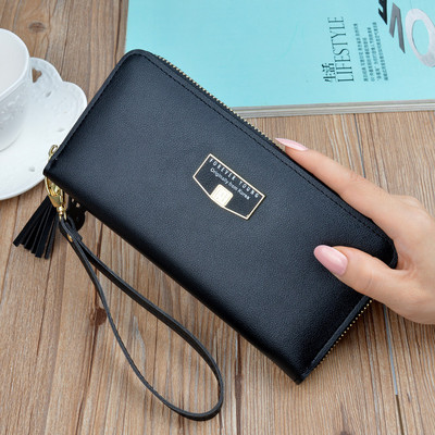 Γυναικείο μοντέρνο πορτοφόλι με κοντή λαβή και φούντα