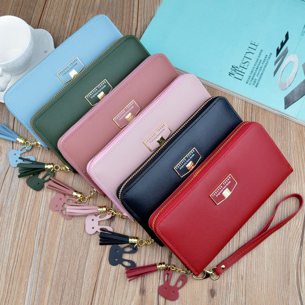 Γυναικείο μοντέρνο πορτοφόλι με κοντή λαβή και φούντα