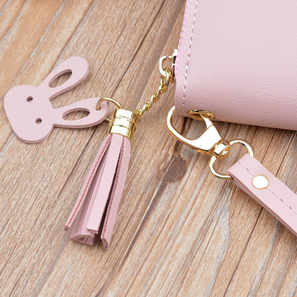 Γυναικείο μοντέρνο πορτοφόλι με κοντή λαβή και φούντα