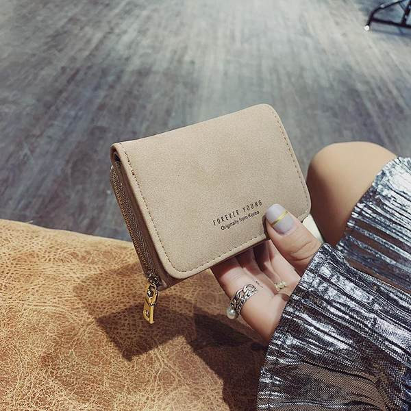 Γυναικείο μίνι πορτοφόλι με δύο θήκες για κέρματα και φερμουάρ