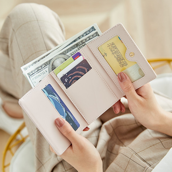 Μοντέρνο γυναικείο πορτοφόλι με τσέπη δεκάρα - έκο δέρμα