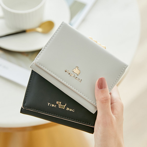 Μοντέρνο γυναικείο πορτοφόλι με τσέπη δεκάρα - έκο δέρμα