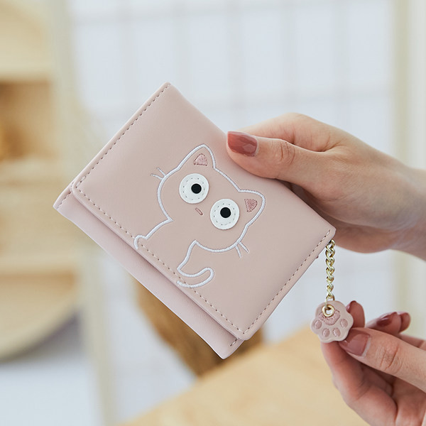 Sieviešu maks ar izšuvumu un metāla aizdari