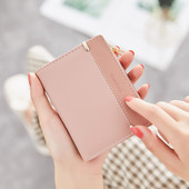 Neliels sieviešu maks ar metāla aizdari - mākslīgā āda