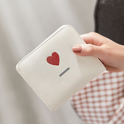 Μικρό γυναικείο πορτοφόλι με κεντήματα - οικολογικό δέρμα