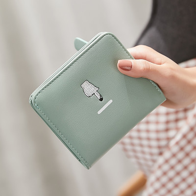 Μικρό γυναικείο πορτοφόλι με κεντήματα - οικολογικό δέρμα