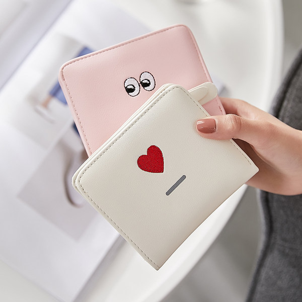 Μικρό γυναικείο πορτοφόλι με κεντήματα - οικολογικό δέρμα