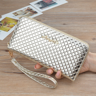 Funkcionāls sieviešu maks ar rāvējslēdzēju un īsu rokturi