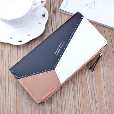 Μοντέρνο πορτοφόλι από οικολογικό δέρμα με μεταλλική στερέωση και φερμουάρ