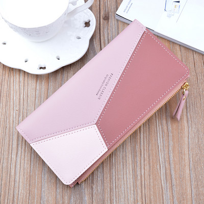 Μοντέρνο πορτοφόλι από οικολογικό δέρμα με μεταλλική στερέωση και φερμουάρ