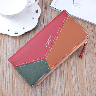 Μοντέρνο πορτοφόλι από οικολογικό δέρμα με μεταλλική στερέωση και φερμουάρ