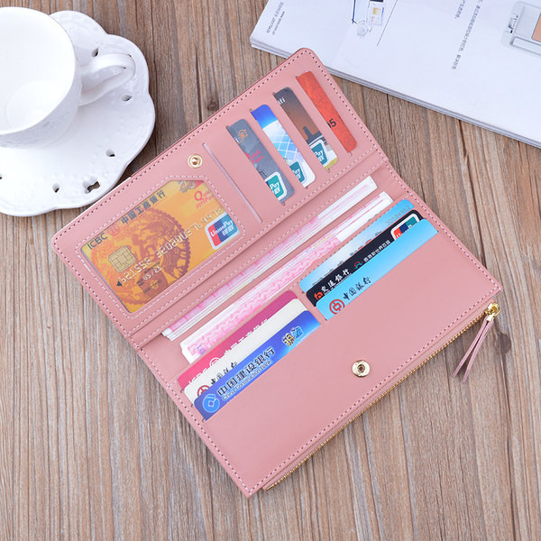 Μοντέρνο πορτοφόλι από οικολογικό δέρμα με μεταλλική στερέωση και φερμουάρ