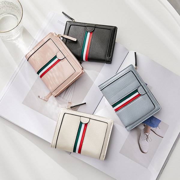 Έκο δερμάτινο πορτοφόλι νέο μοντέλο με μεταλλικό κούμπωμα για γυναίκες