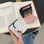 Γυναικείο πορτοφόλι από οικολογικό δέρμα - με μεταλλική στερέωση