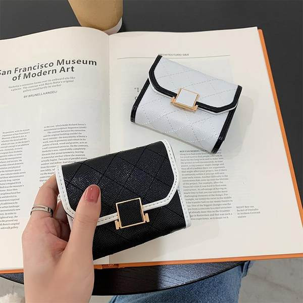 Γυναικείο πορτοφόλι από οικολογικό δέρμα - με μεταλλική στερέωση