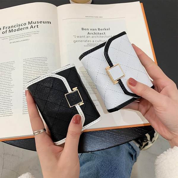 Γυναικείο πορτοφόλι από οικολογικό δέρμα - με μεταλλική στερέωση