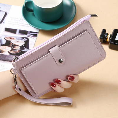 Γυναικείο μοντέρνο έο δερμάτινο πορτοφόλι με φερμουάρ και λαβή