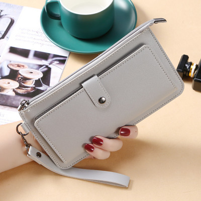 Γυναικείο μοντέρνο έο δερμάτινο πορτοφόλι με φερμουάρ και λαβή