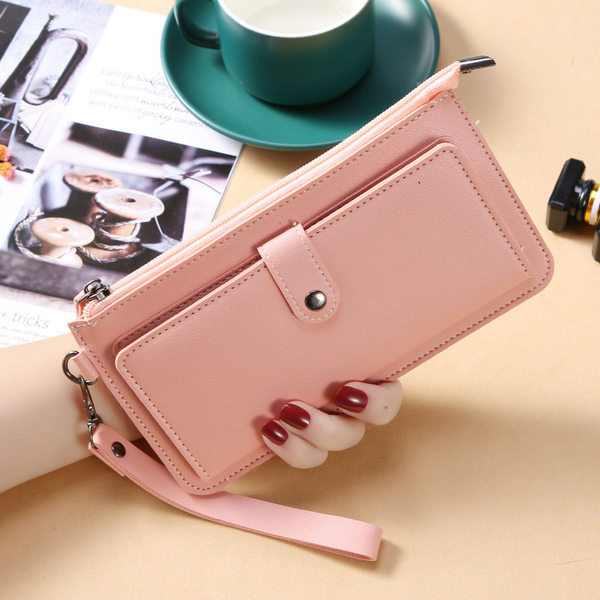 Γυναικείο μοντέρνο έο δερμάτινο πορτοφόλι με φερμουάρ και λαβή