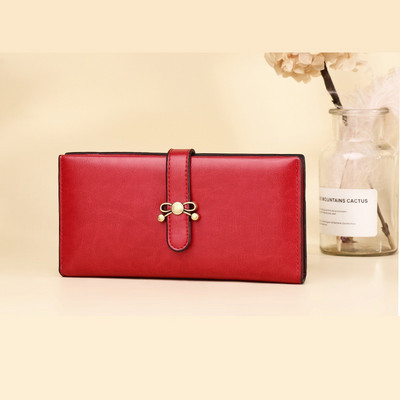 Γυναικείο πορτοφόλι από οικολογικό δέρμα με κούμπωμα