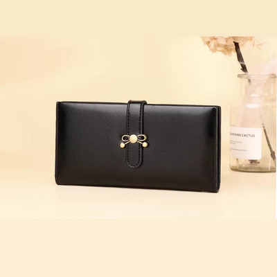 Γυναικείο πορτοφόλι από οικολογικό δέρμα με κούμπωμα