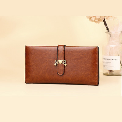 Γυναικείο πορτοφόλι από οικολογικό δέρμα με κούμπωμα