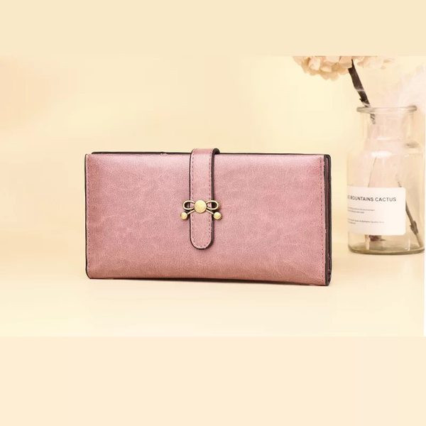 Γυναικείο πορτοφόλι από οικολογικό δέρμα με κούμπωμα