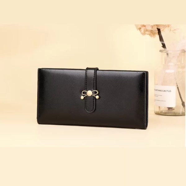 Γυναικείο πορτοφόλι από οικολογικό δέρμα με κούμπωμα