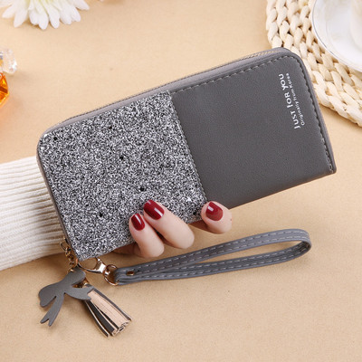 Γυναικείο έκο δερμάτινο πορτοφόλι με γυαλιστερό εφέ και λαβή