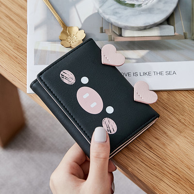 Μικρό γυναικείο πορτοφόλι με τρισδιάστατο στοιχείο και μεταλλική στερέωση