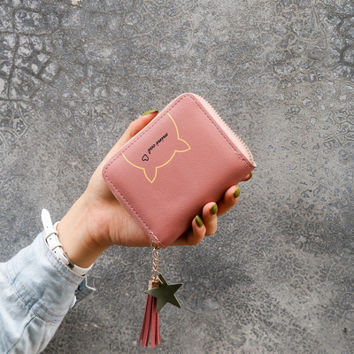 Έκο δερμάτινο γυναικείο πορτοφόλι με απλικέ και μενταγιόν