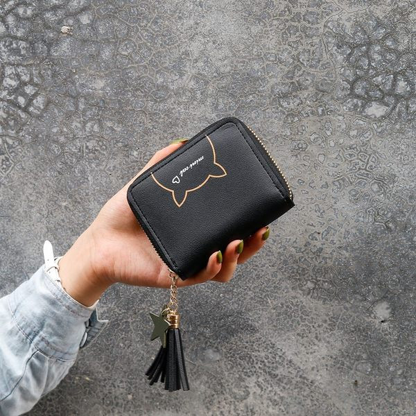 Έκο δερμάτινο γυναικείο πορτοφόλι με απλικέ και μενταγιόν