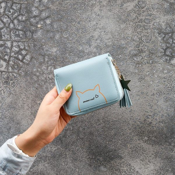 Έκο δερμάτινο γυναικείο πορτοφόλι με απλικέ και μενταγιόν