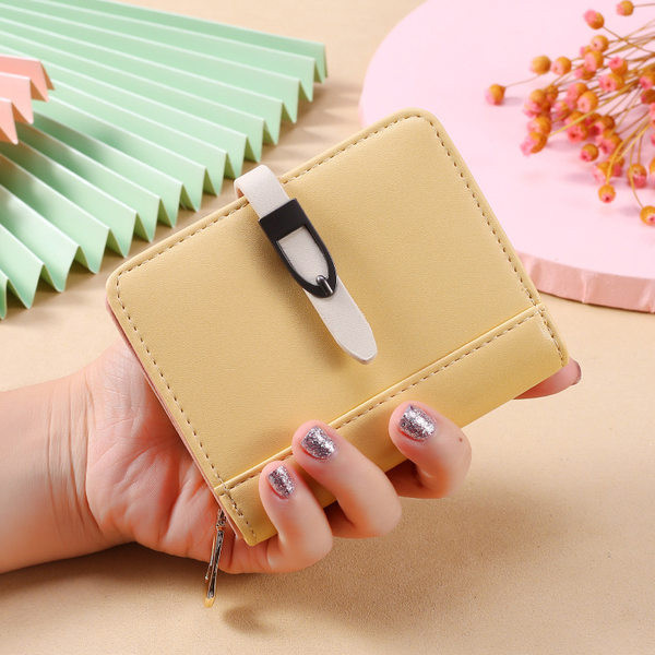 Έκο δερμάτινο πορτοφόλι  γυναικέιο με μεταλλικό στοιχείο