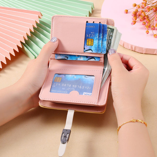 Έκο δερμάτινο πορτοφόλι  γυναικέιο με μεταλλικό στοιχείο