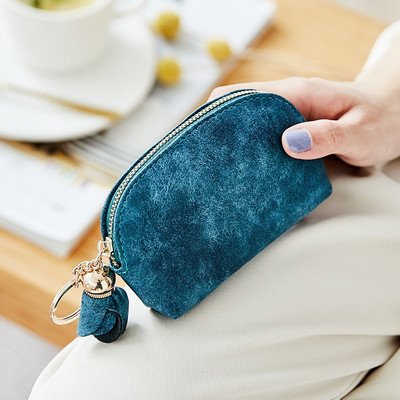 Καθημερινό γυναικείο πορτοφόλι με φούντα και φερμουάρ