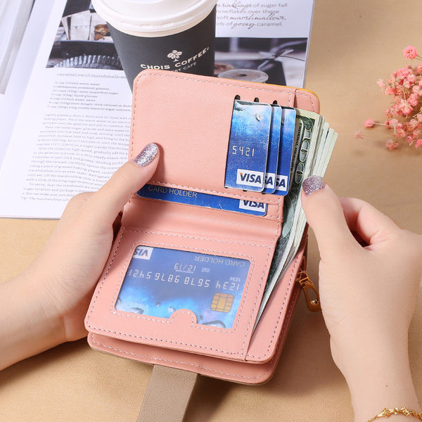 Mazs ādas maciņš ar rāvējslēdzēju un metāla apdari