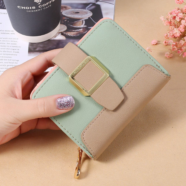 Mazs ādas maciņš ar rāvējslēdzēju un metāla apdari