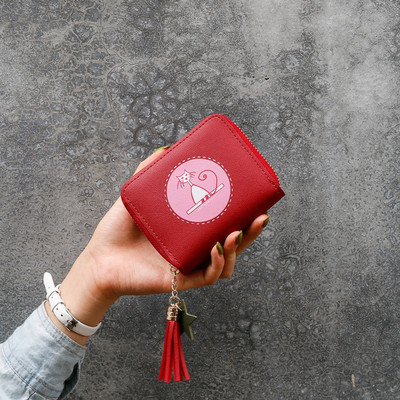 Ādas sieviešu maks ar kulonu un aplikāciju